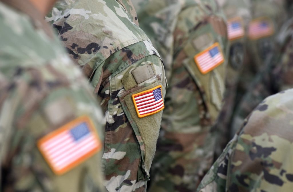 American Soldiers And Flag Of USA